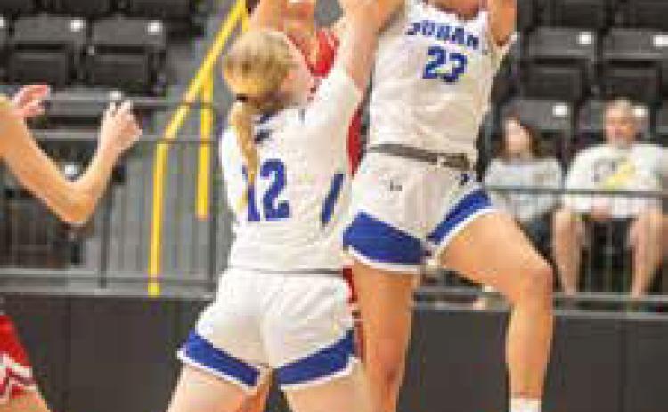 Lady Lions Emma Green and Abrianna Freeman are shown with Sulphur players during the Madill Tournament. Matt Swearengin | Durant Democrat