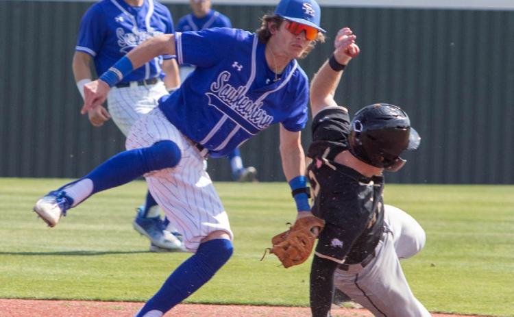 Savage Storm player Gage Dollins is shown during a recent game with Harding. Matt Swearengin | Durant Democrat