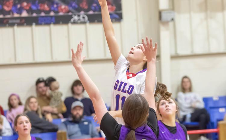 RIGHT: Silo Lady Rebel Brooklynn Redwine shoots the ball in a recent home game.
