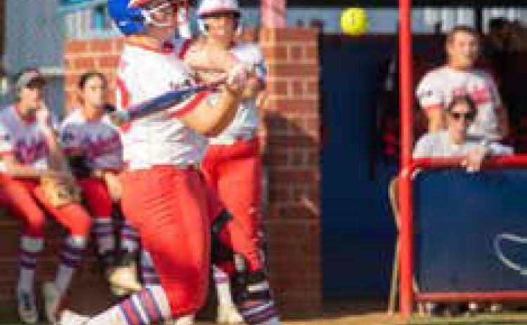 Silo Lady Rebel Kostina Tubby is about to hit the ball in a Monday game with the Calera Lady Bulldogs. Matt Swearengin | Durant Democrat