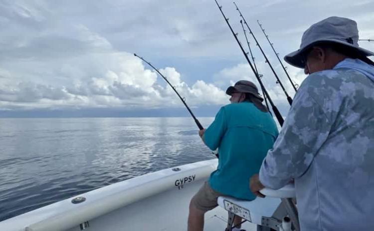 Mark Swearengin reels one in during a recent fishing trip to Guatemala. Photo provided